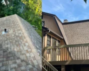 A house in Pawcatuck, CT prepared for winter by a roofing company near me